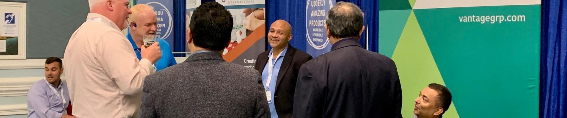 Charleston 2022 booths and attendees networking Charleston 2022 attendees